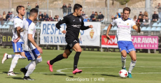 Gerard Oliva peleando ante varios oponentes del Deportivo Aragón. Foto: GuiemSports.
